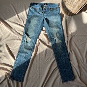 Bebe Low Raise Floral Print Ripped Jean